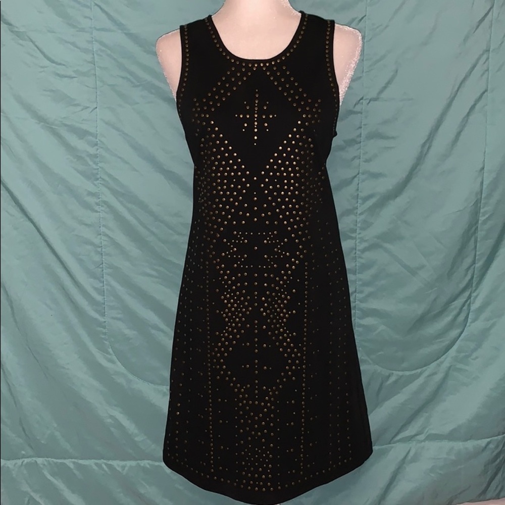 Black dress with antique brass embellishments